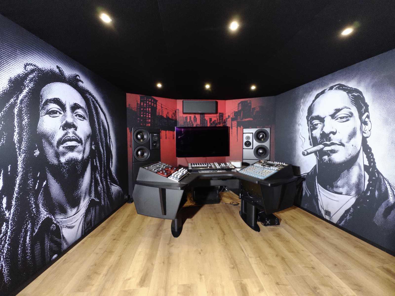 Symmetric front view: both murals framing the monitor wall and the central mix position.